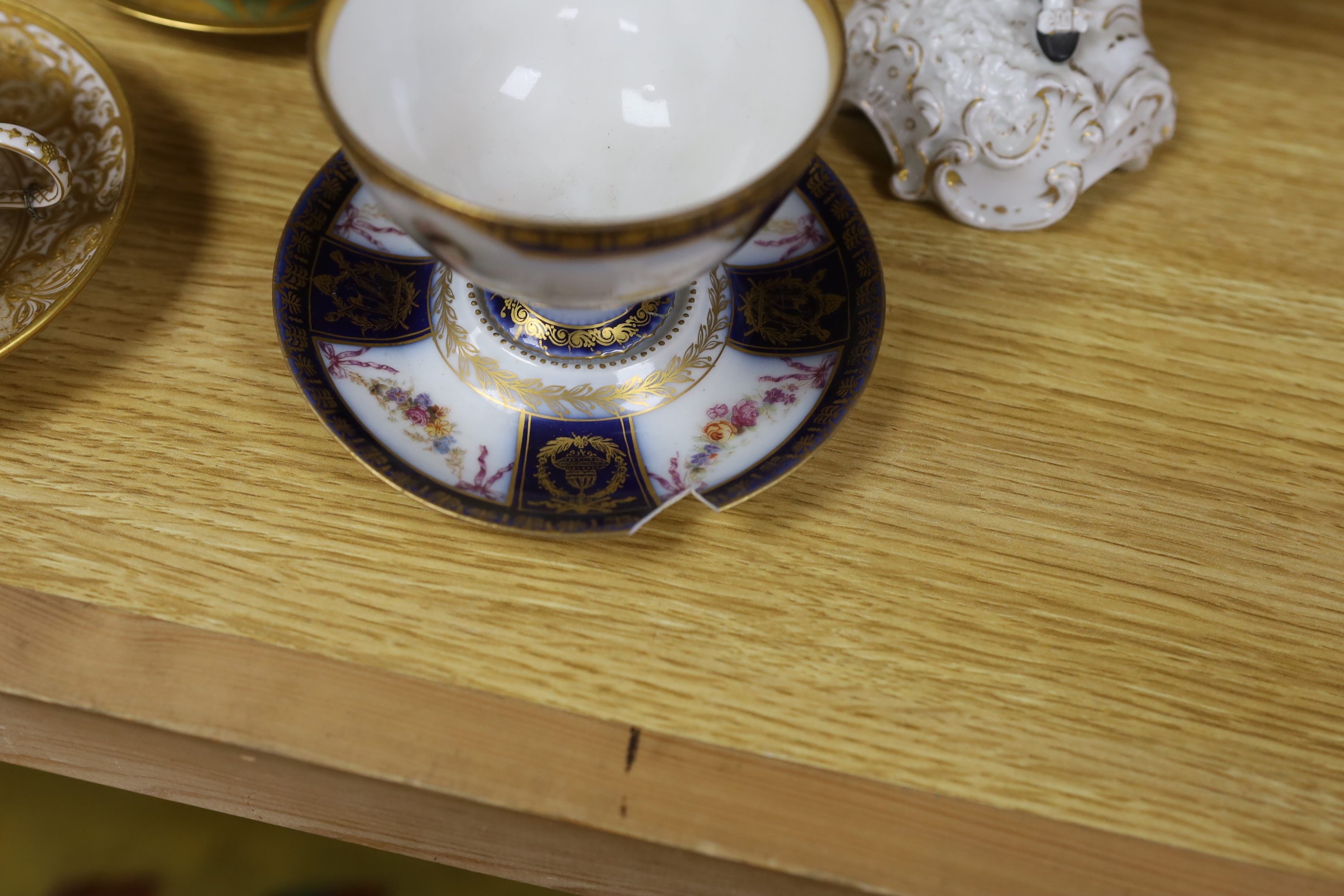A group of European porcelain tableware to include a pair of figures, Lowestoft jug, Dresden cups etc.
